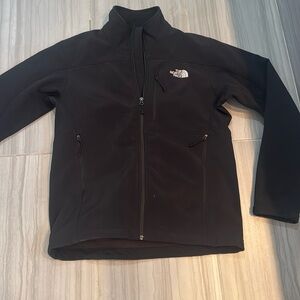 Men’s North Face in between jacket.